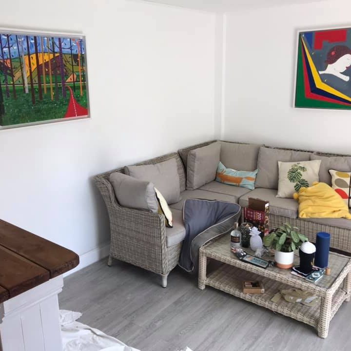 Colourful paintings on white walls