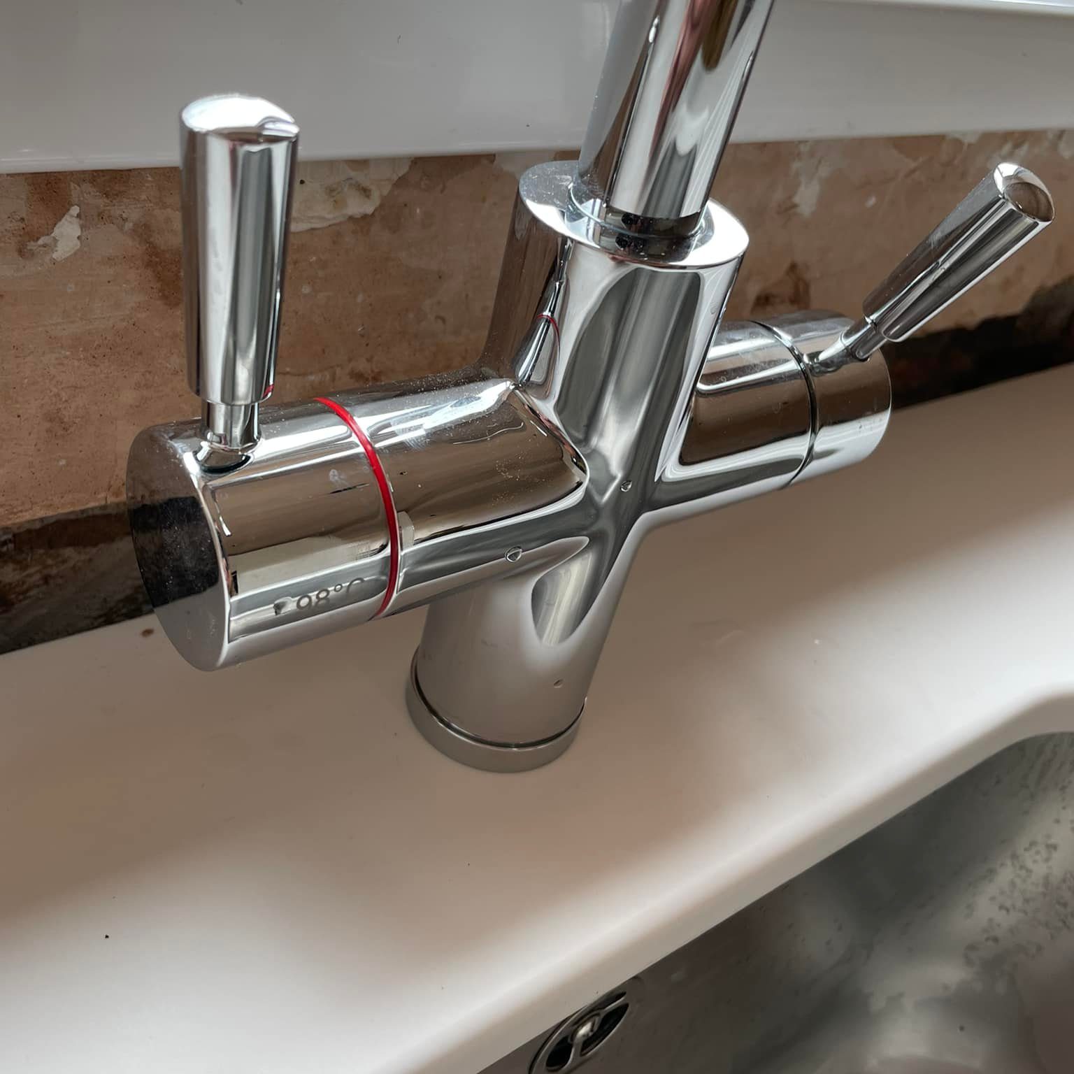 Chrome hot and cold taps