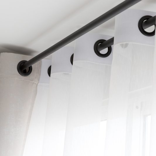 White curtains with black ringlets